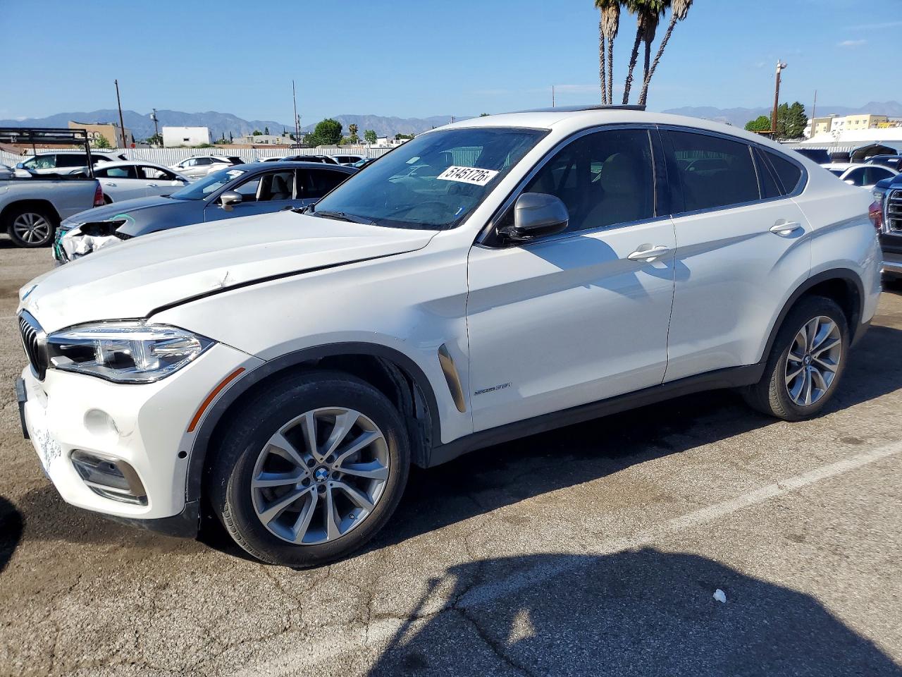 2019 BMW X6 VIN 5UXKU0C52K0S97665 photo 1