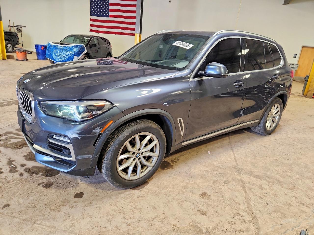 2021 BMW X5 VIN 5UXCR6C06M9D87075 photo 1