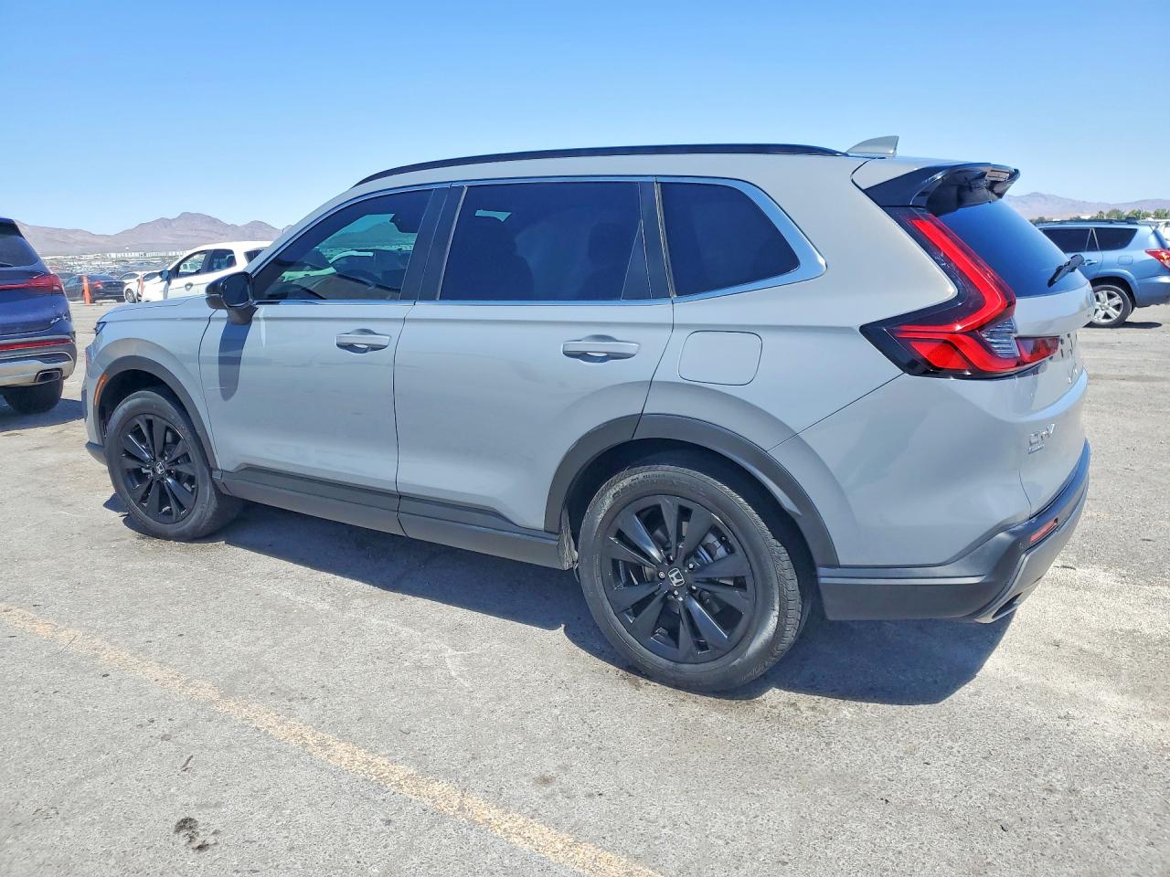 2023 Honda Crv VIN 2HKRS6H90PH810975 photo 2