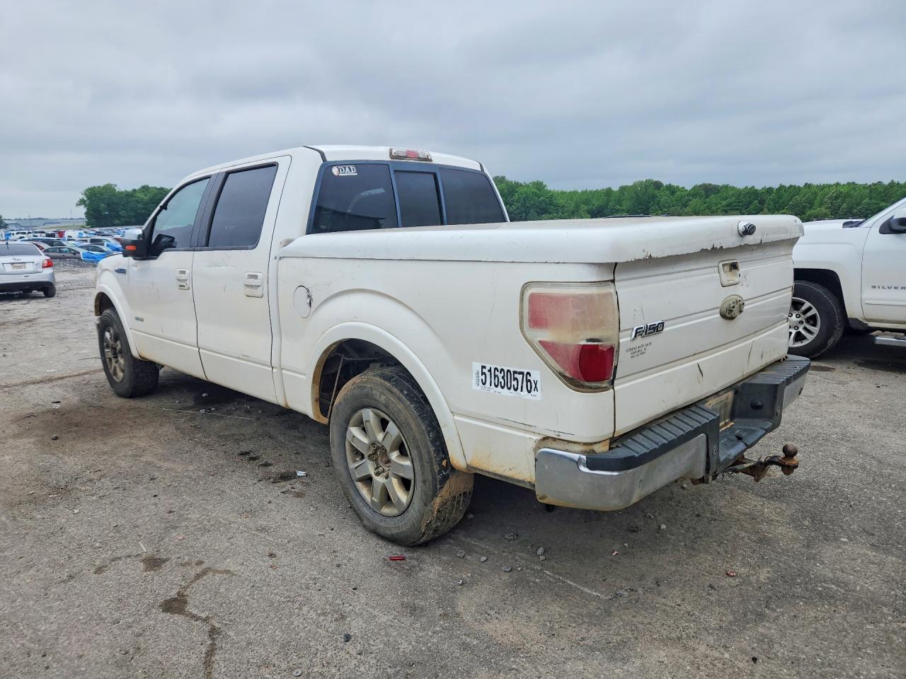 2011 Ford F150 VIN 1FTFW1CTXBFC63147 photo 2