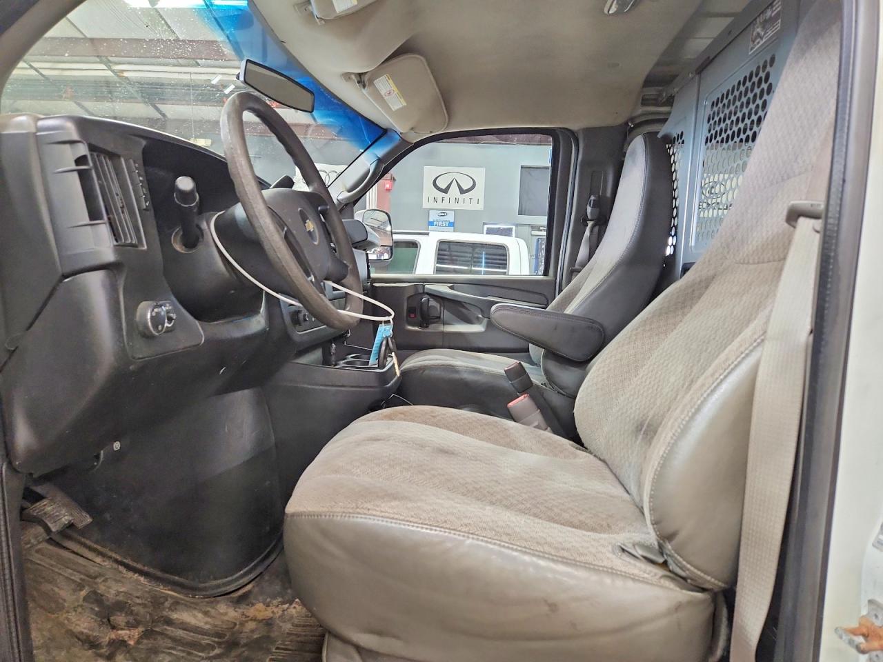 2014 CHEV Express VIN 1GCWGFCA4E1123119 photo 7