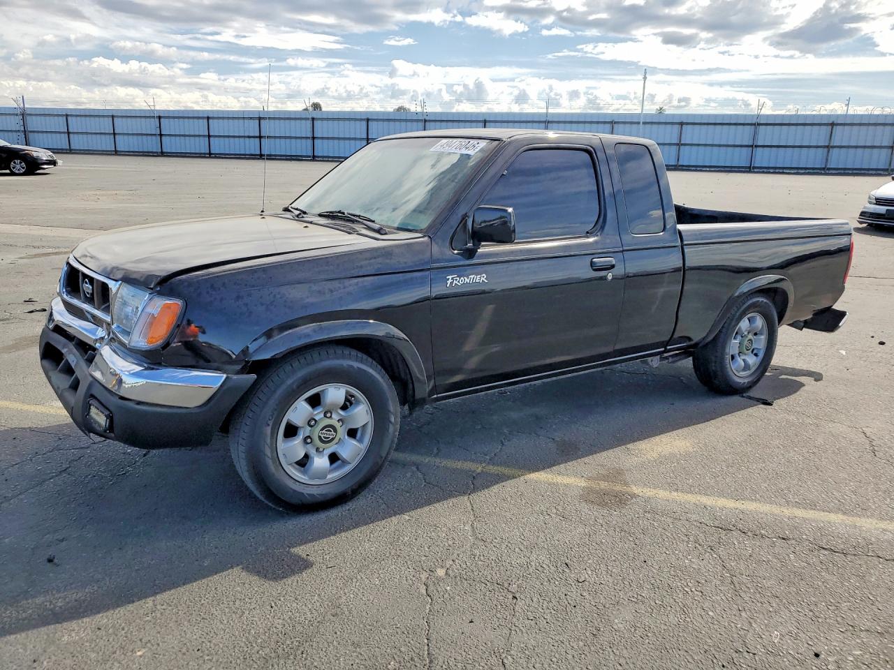 2000 Nissan Frontier VIN 1N6DD26S3YC355584 photo 1
