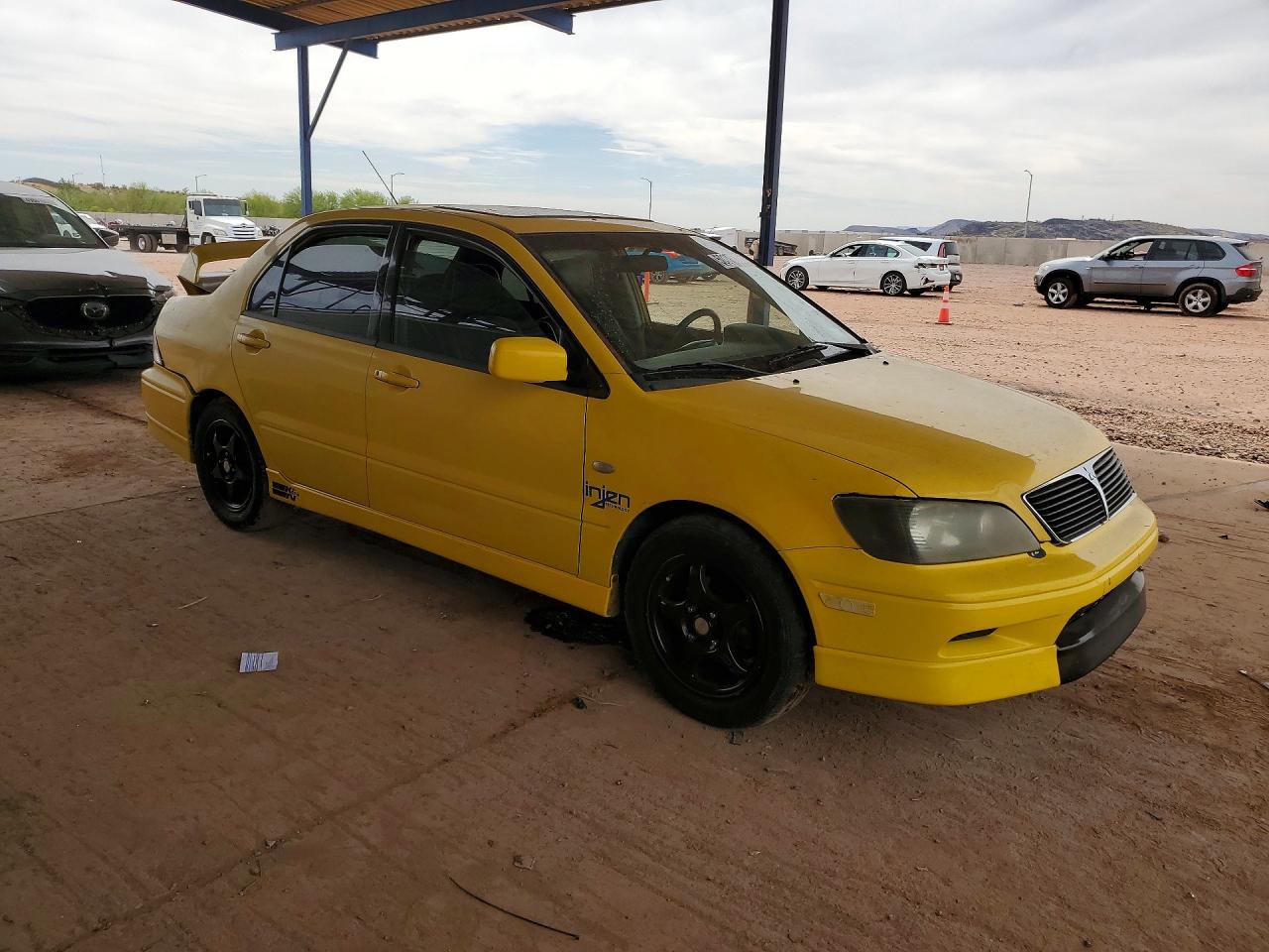 2002 Mitsubishi Lancer VIN JA3AJ86E52U063821 photo 4