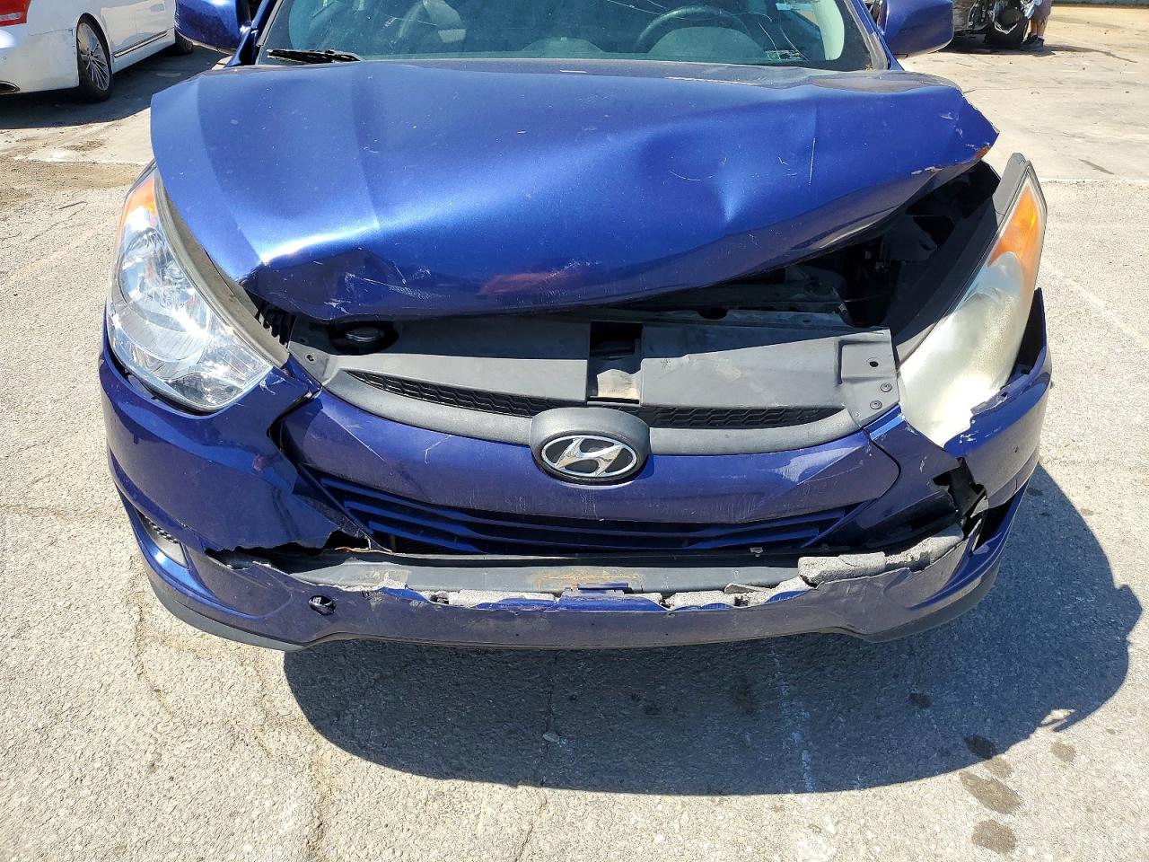 2011 Hyundai Tucson VIN KM8JU3AC0BU129124 photo 12