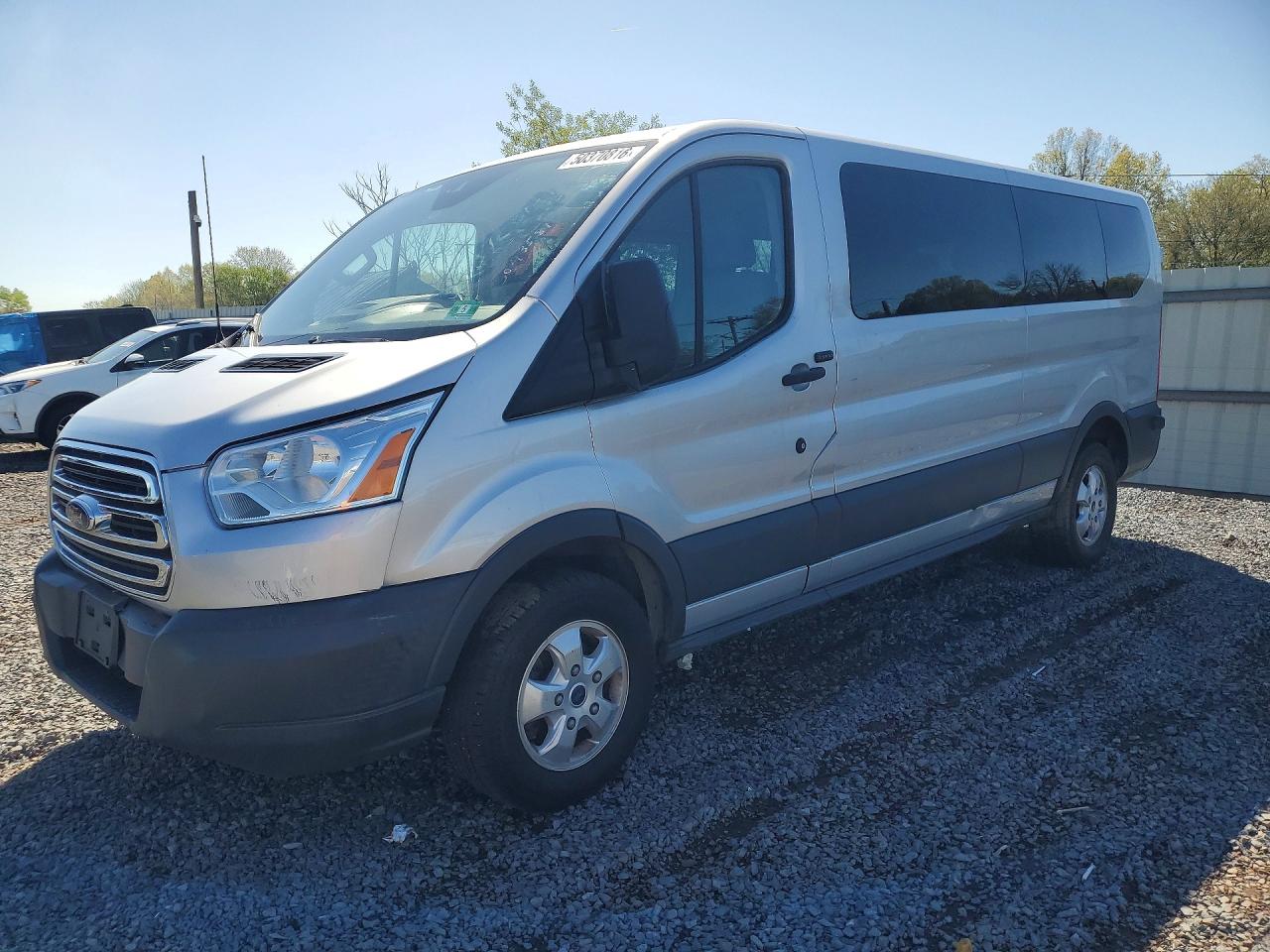 2018 Ford Transit VIN 1FBZX2YG1JKA47788 photo 1