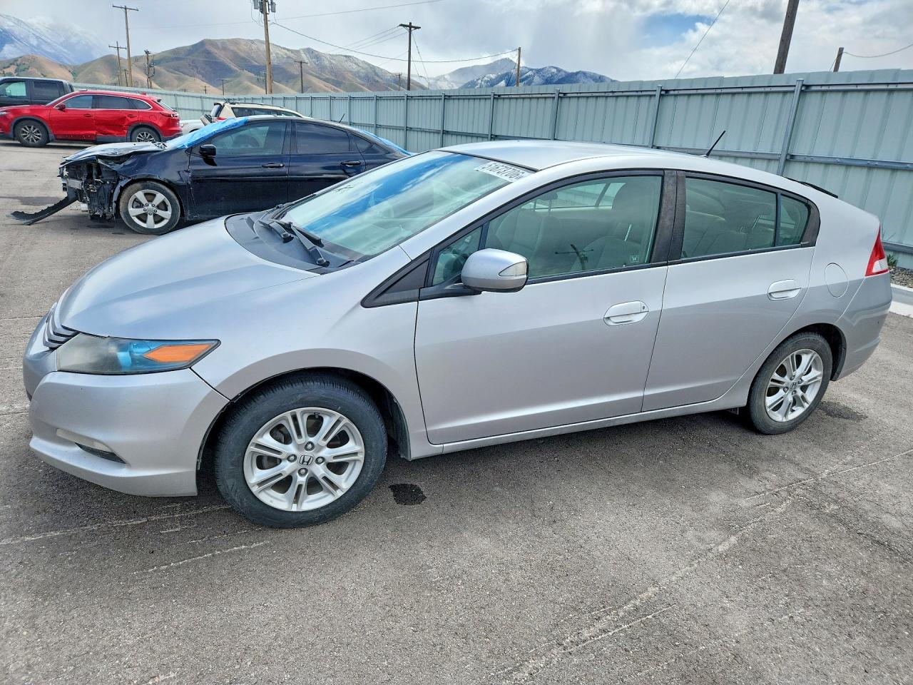 2010 Honda Insight VIN JHMZE2H74AS017880 photo 1