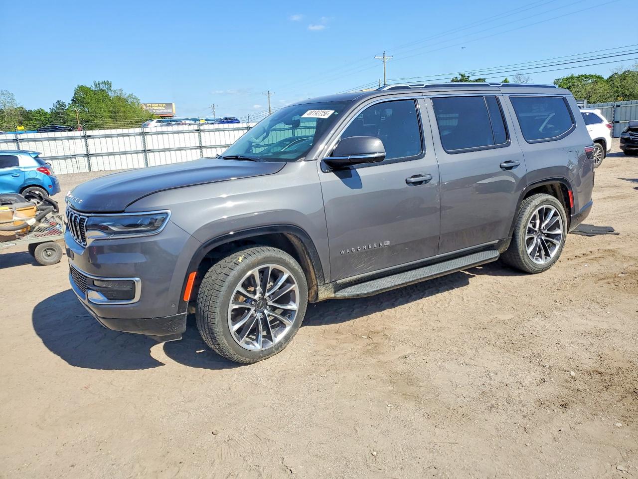 2022 Jeep Wagoneer VIN 1C4SJUBTXNS109145 photo 1