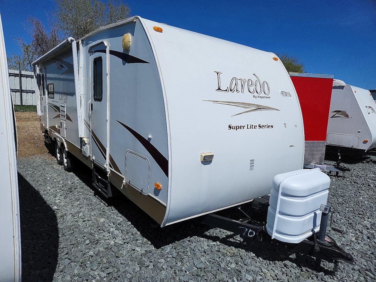 2009 KEYSTONE Laredo VIN 4YDT272209L600704 photo 1