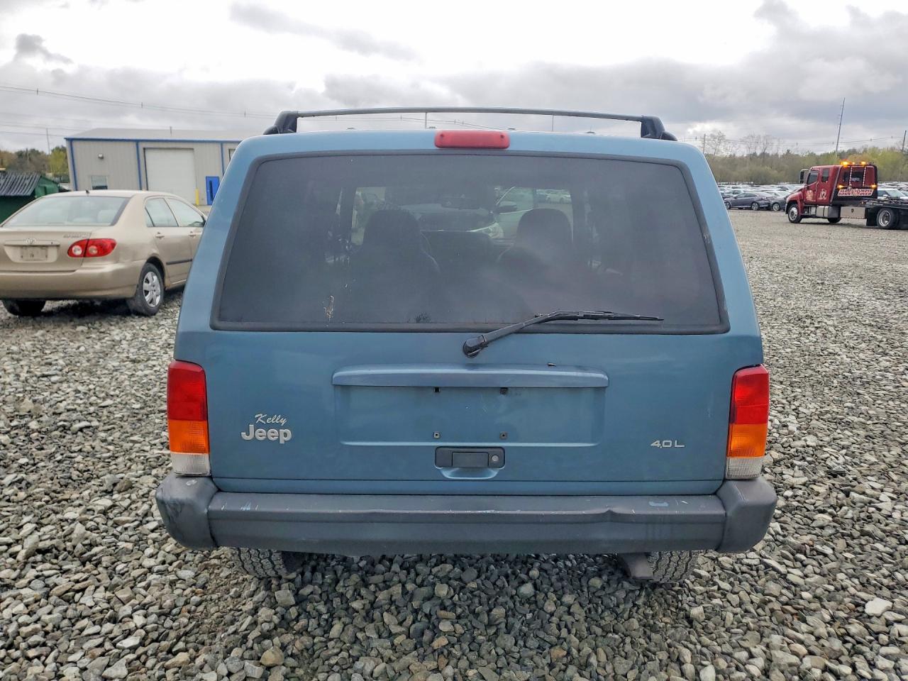 1999 Jeep Cherokee VIN 1J4FF68S7XL664008 photo 6
