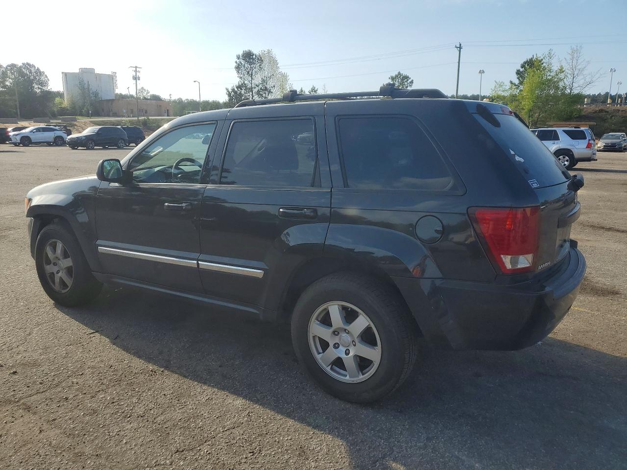 2010 Jeep Cherokee VIN 1J4PS4GKXAC112516 photo 2