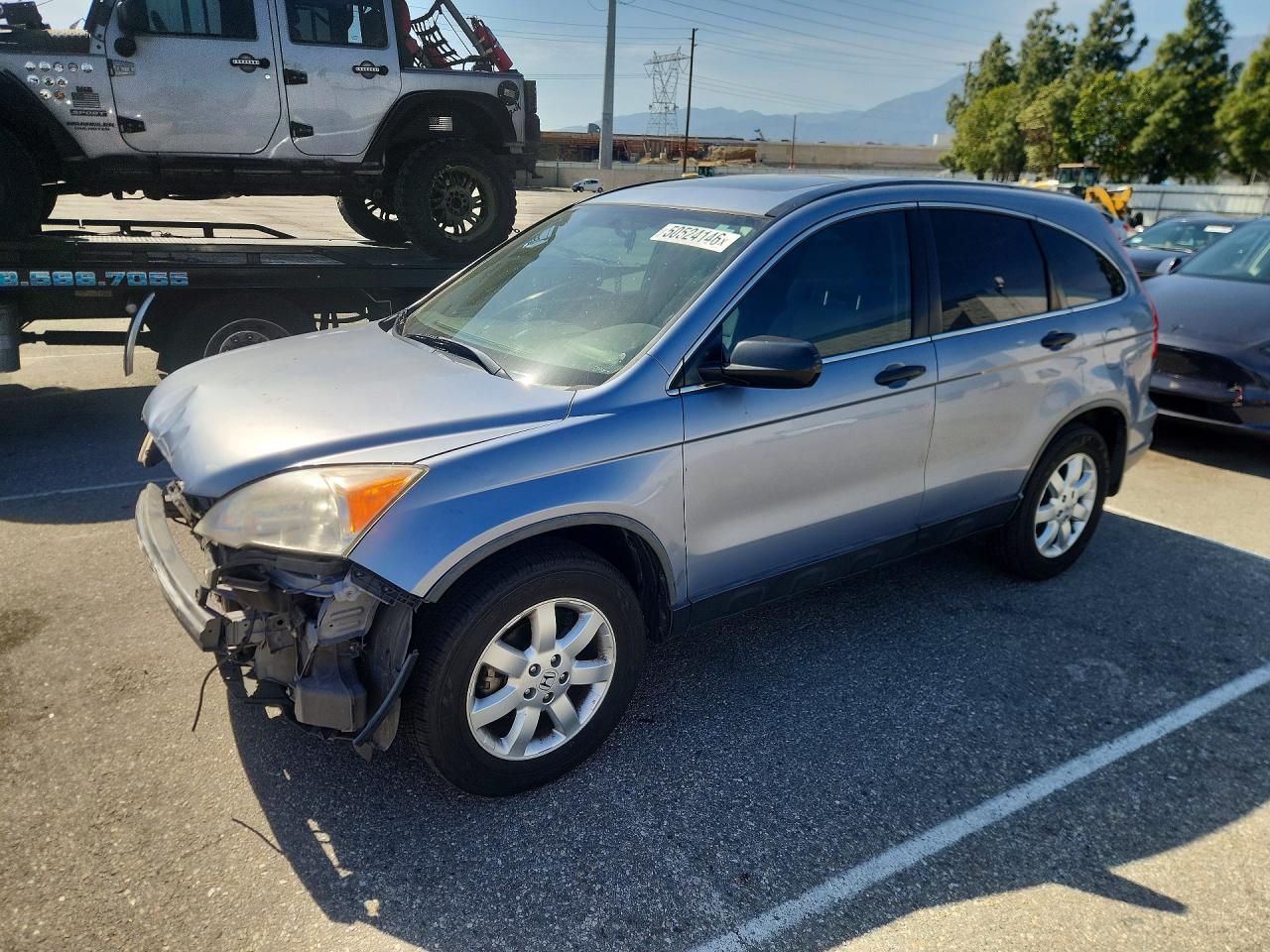 2007 Honda Crv VIN JHLRE38507C052718 photo 1