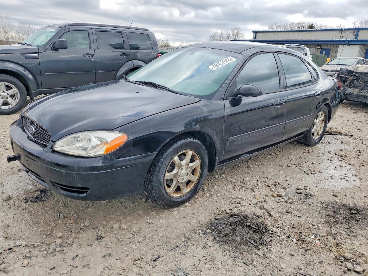 2007 Ford Taurus VIN 1FAHP53U27A116563 photo 1