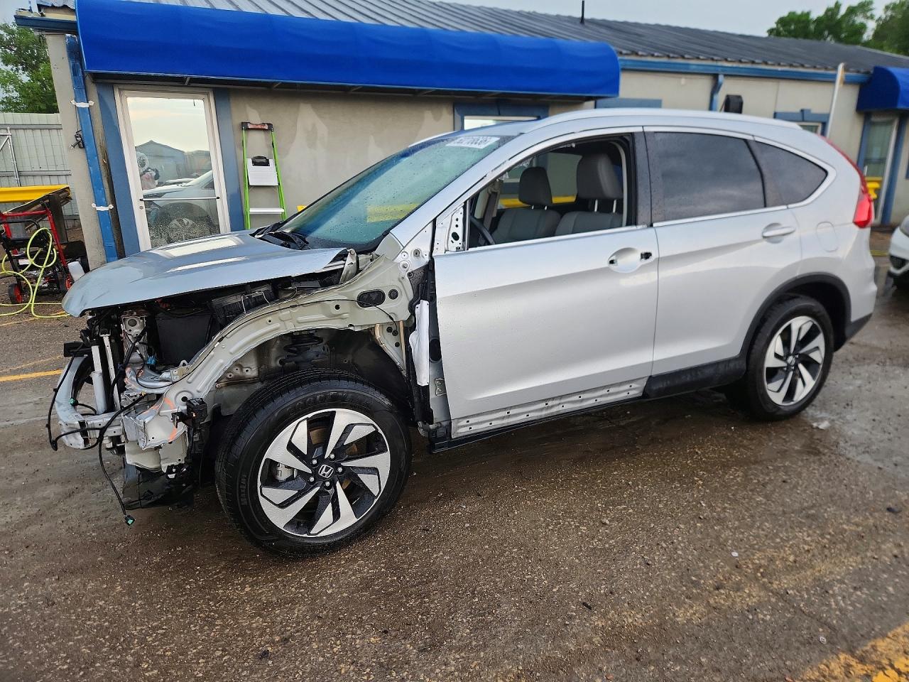 2016 Honda Crv VIN 5J6RM4H91GL105588 photo 1