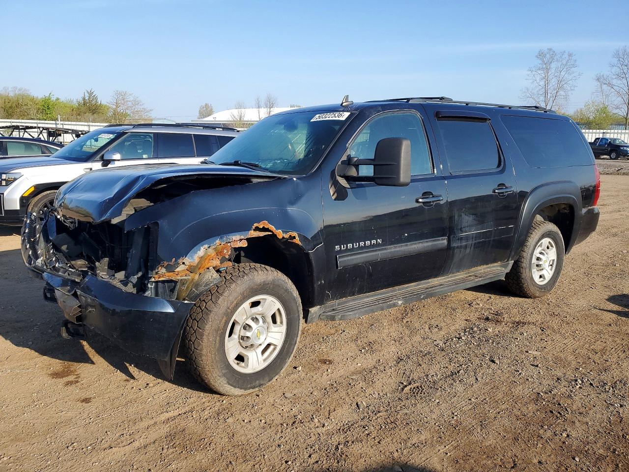 2011 Chevrolet Suburban VIN 1GNWKLEG6BR122928 photo 1