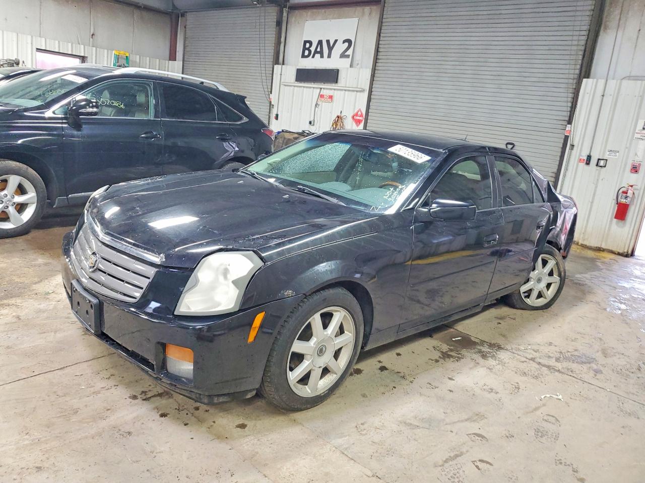 2005 Cadillac Cts VIN 1G6DP567150173521 photo 1