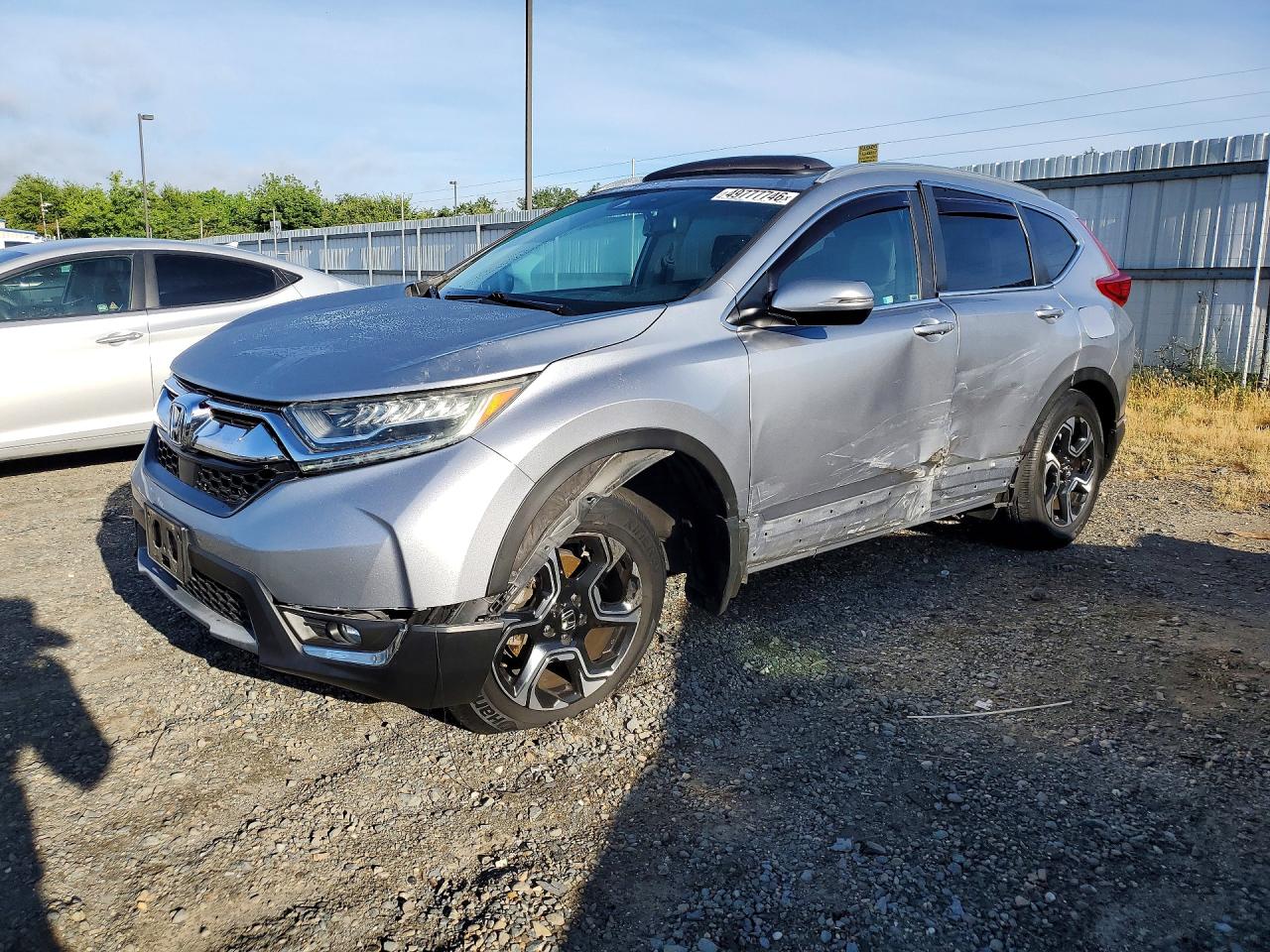 2017 Honda Crv VIN 7FARW1H91HE040894 photo 1