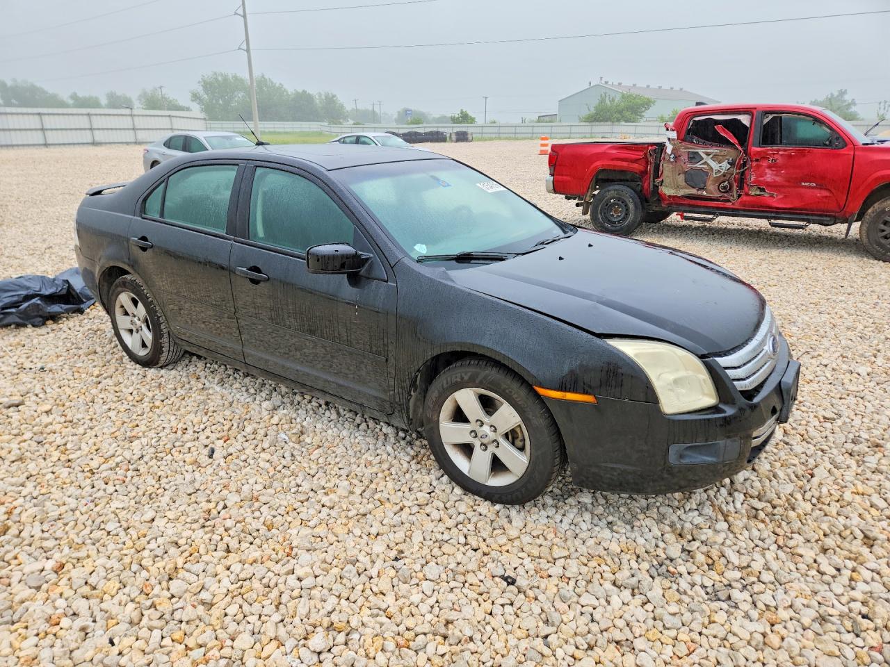 2009 Ford Fusion VIN 3FAHP07Z49R215614 photo 4