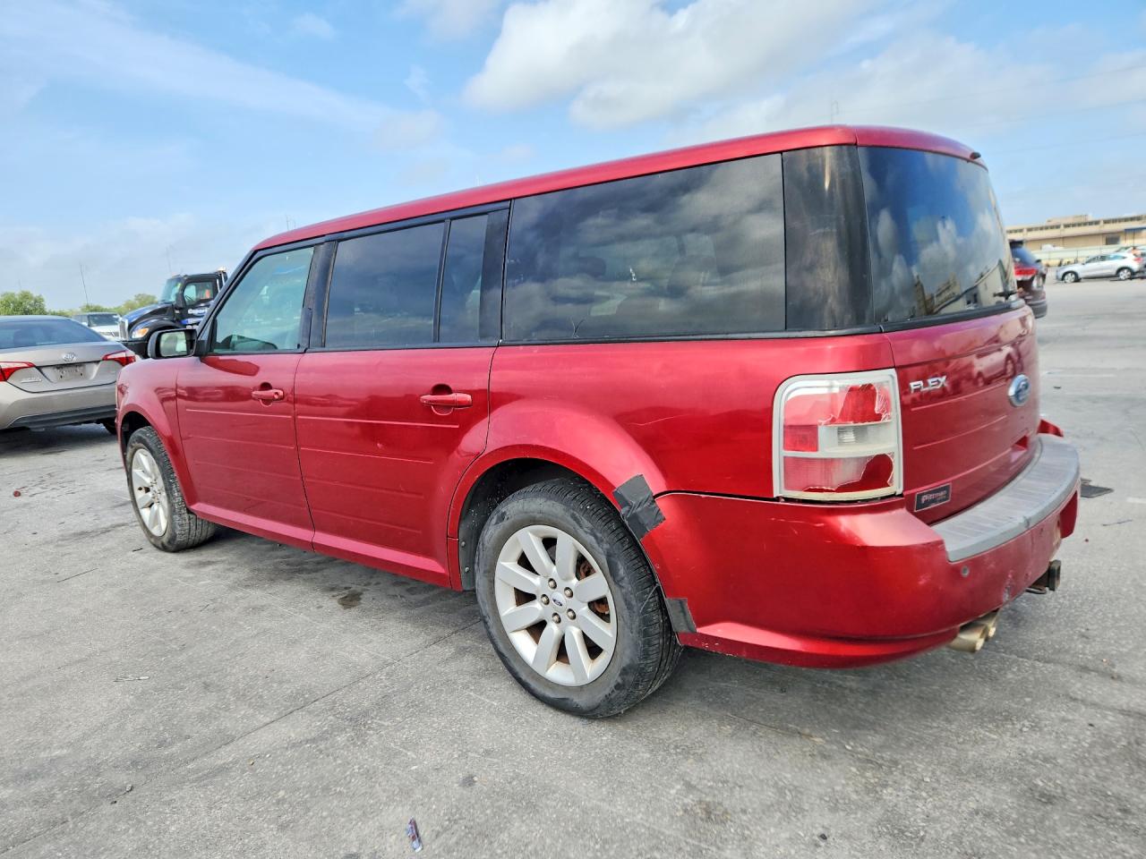 2009 Ford Flex VIN 2FMDK51C79BA70619 photo 2