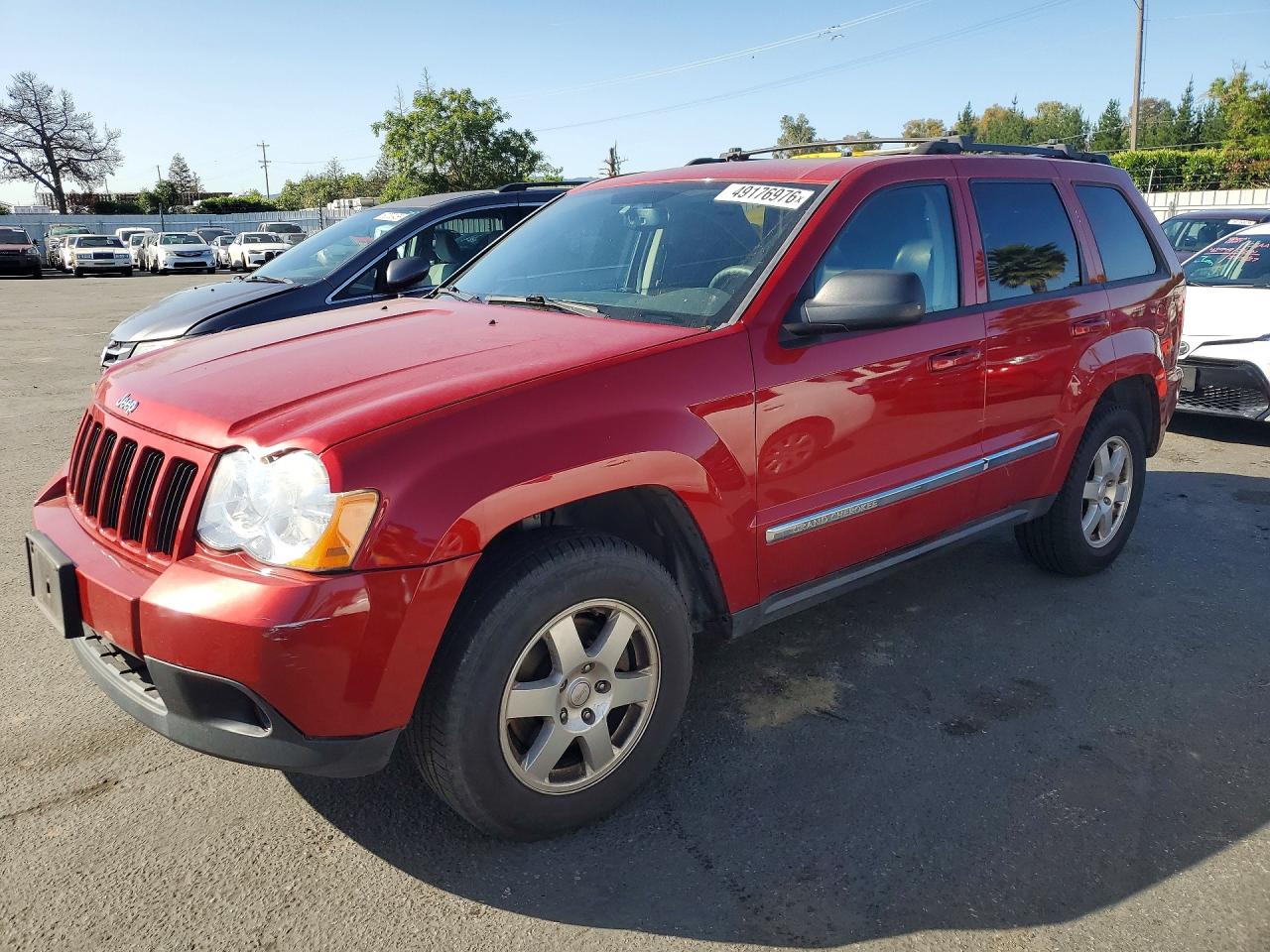 2010 Jeep Cherokee VIN 1J4PR4GK9AC121056 photo 1