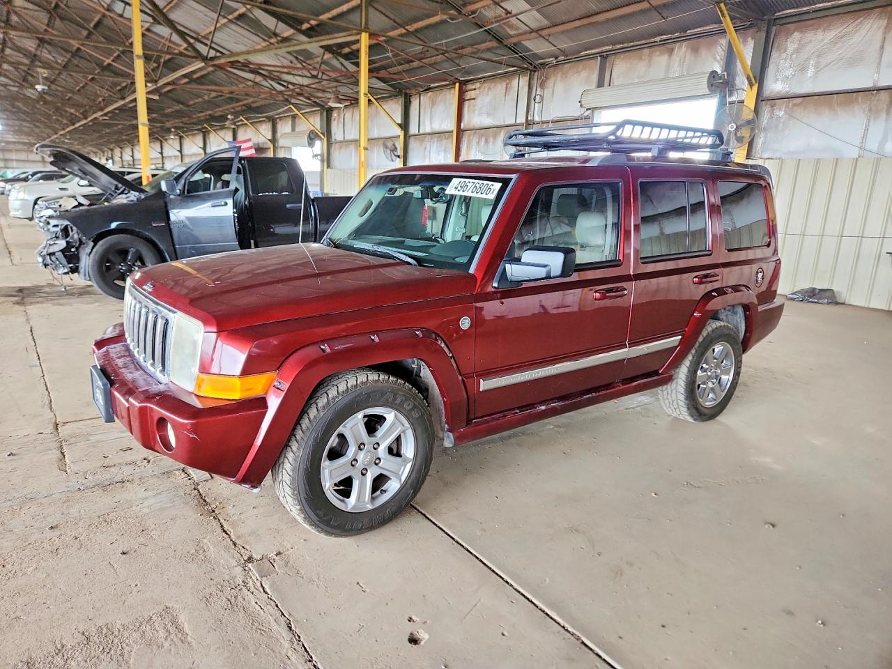 2007 Jeep Commander VIN 1J8HG58207C530195 photo 1