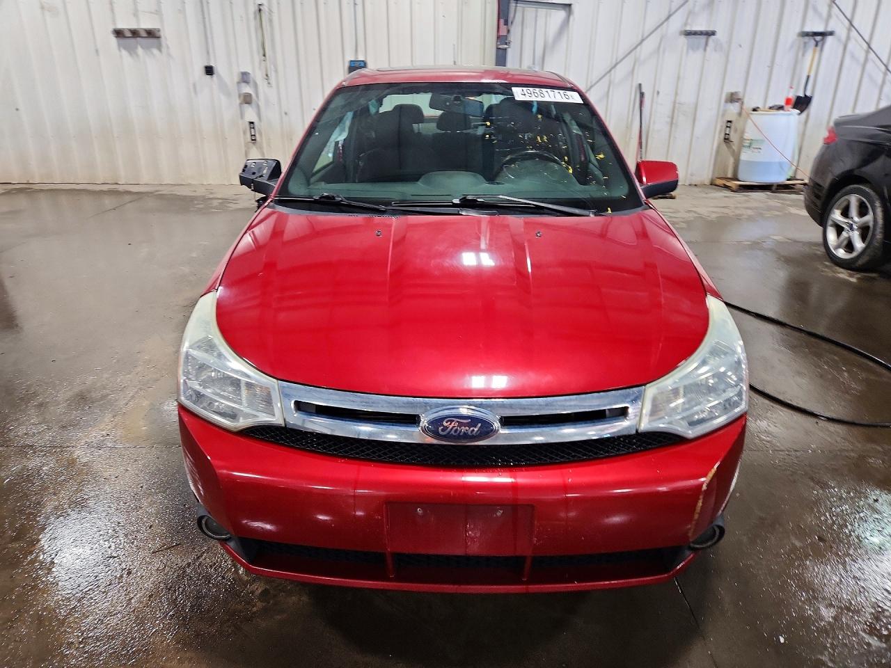 2009 Ford Focus VIN 1FAHP36N79W263847 photo 5