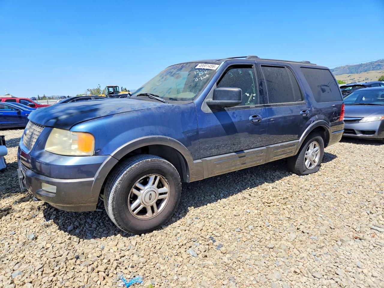 2004 Ford Expedition VIN 1FMPU16L74LA41493 photo 1