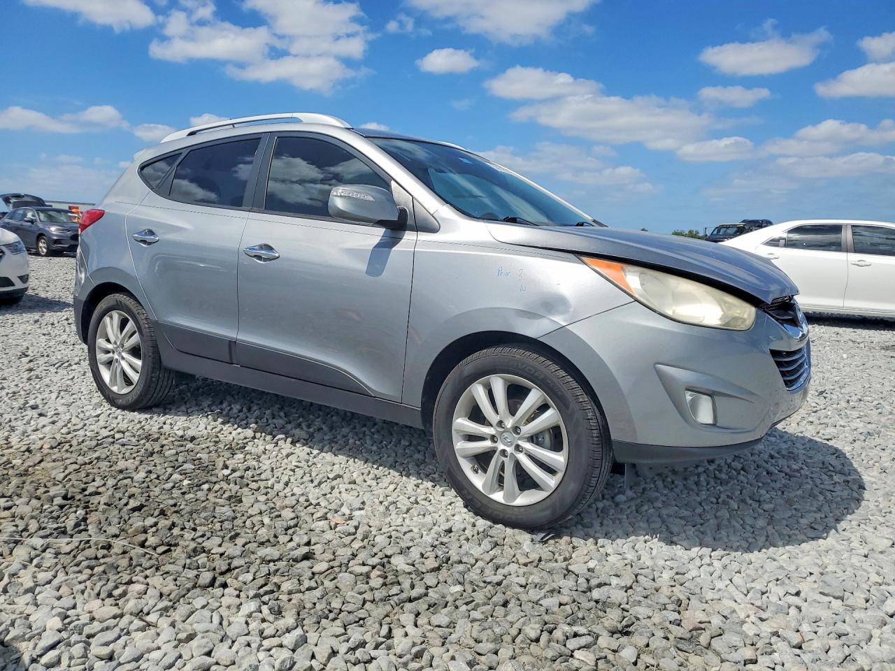 2010 Hyundai Tucson VIN KM8JU3AC5AU079822 photo 4