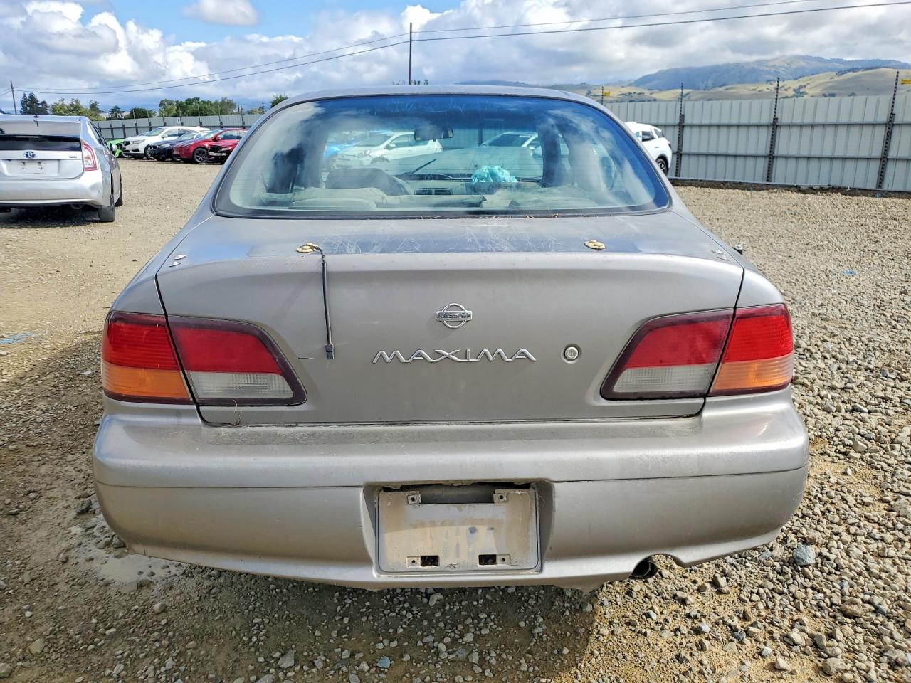 1999 Nissan Maxima VIN JN1CA21A0XT102651 photo 6