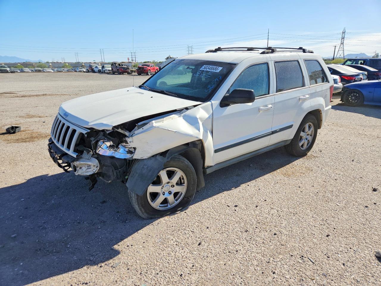 2009 Jeep Cherokee VIN 1J8GR48K19C516597 photo 1