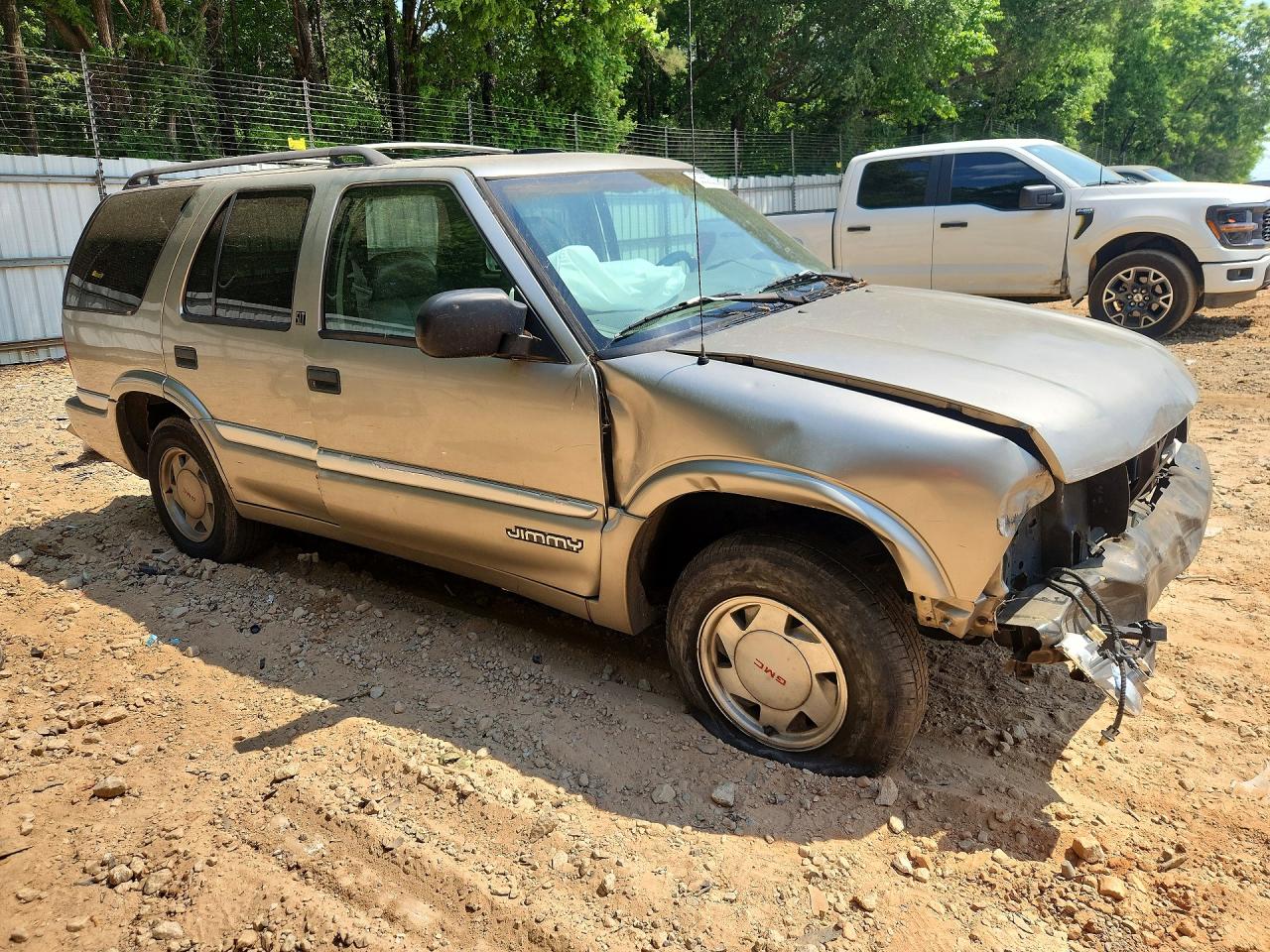 1999 GMC Jimmy VIN 1GKCS13W0X2501969 photo 4