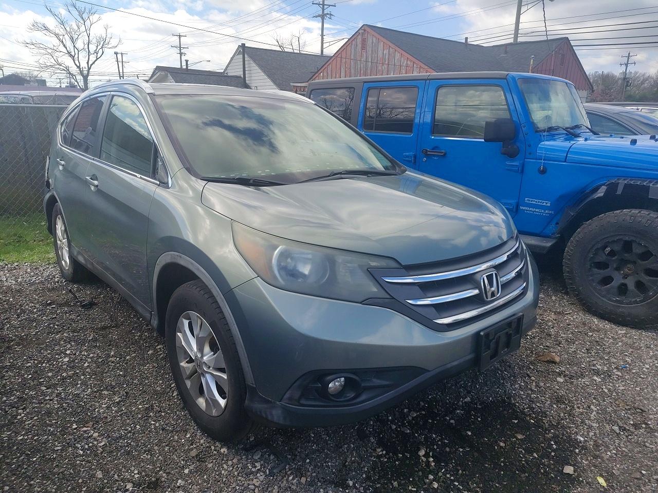 2012 Honda Crv VIN JHLRM4H71CC008554 photo 1