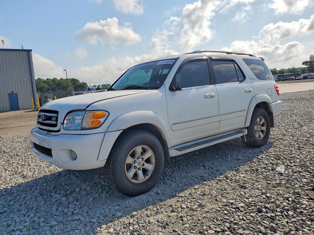 2002 Toyota Sequoia VIN 5TDZT38AX2S093364 photo 1