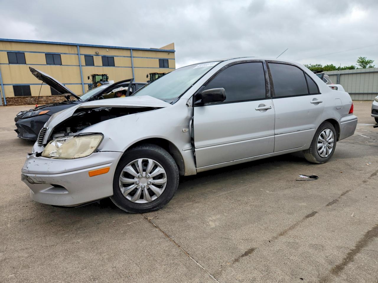 2002 Mitsubishi Lancer VIN JA3AJ26E02U016905 photo 1