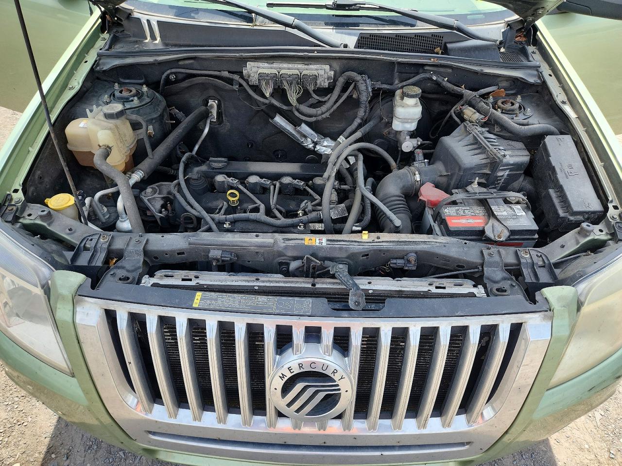 2009 Mercury Mariner VIN 4M2CU81799KJ03814 photo 12