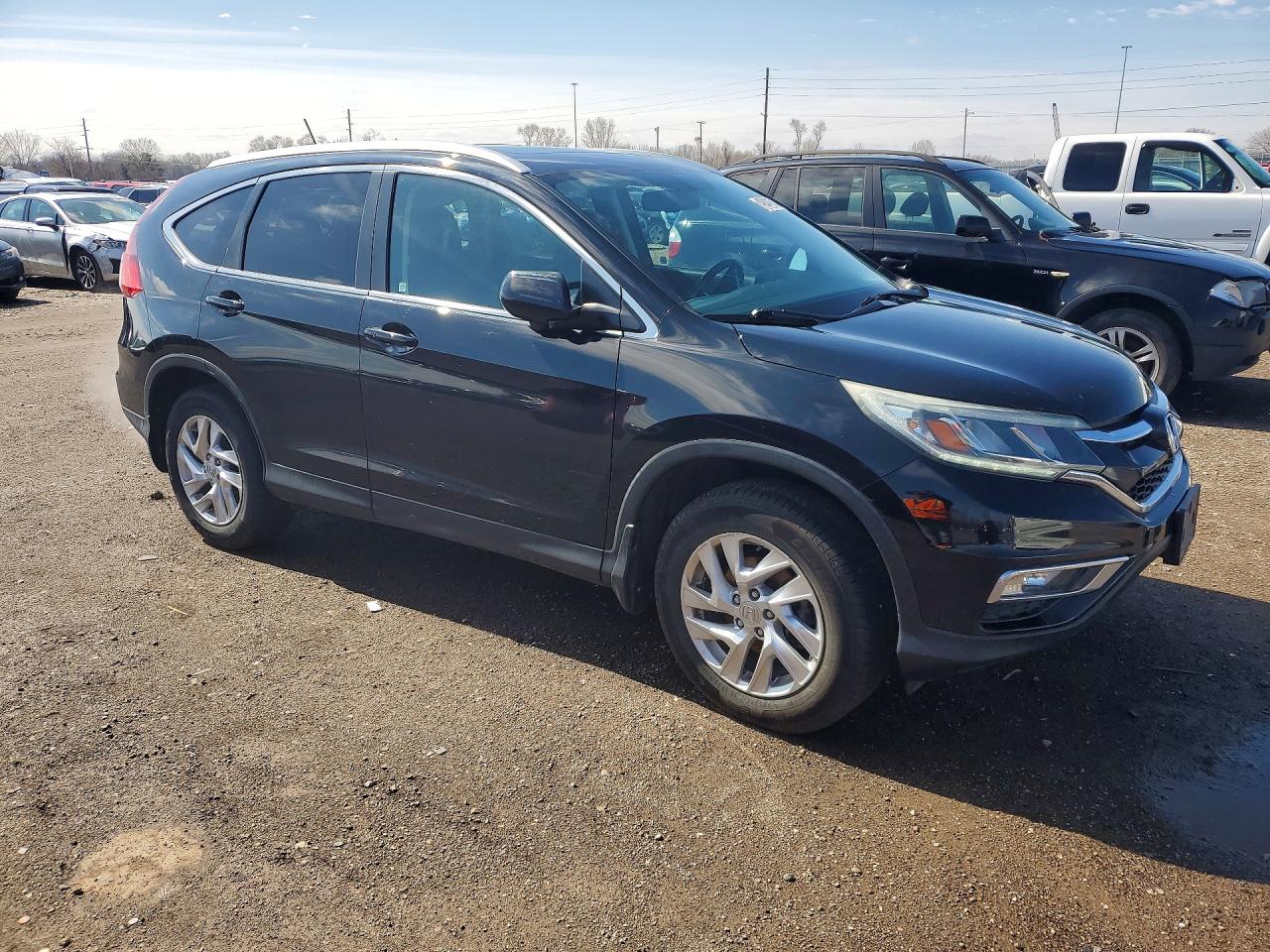 2016 Honda Crv VIN 5J6RM4H79GL000134 photo 4