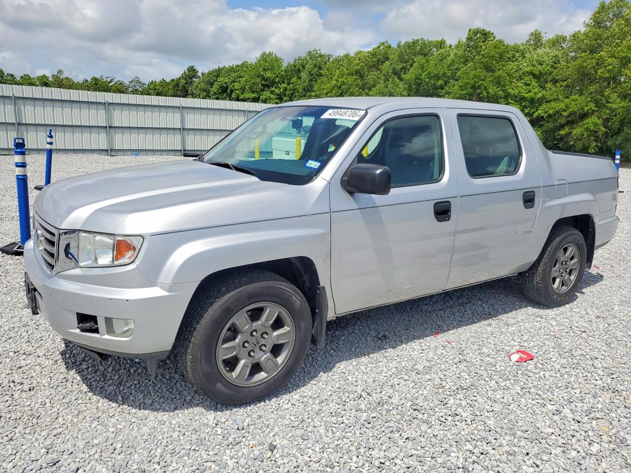 2012 Honda Ridgeline VIN 5FPYK1F27CB004152 photo 1