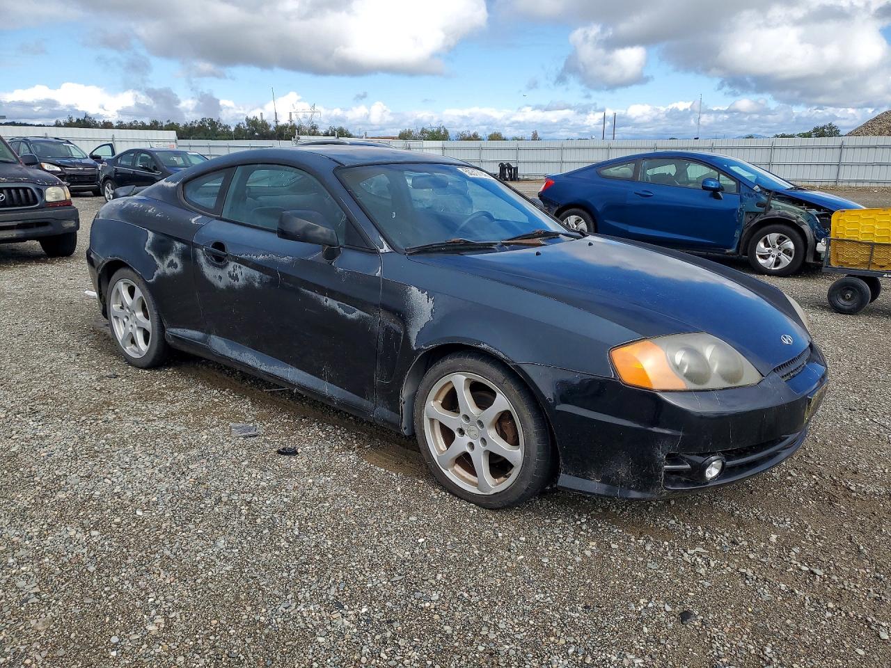 2003 Hyundai Tiburon gt VIN KMHHN65FX3U016509 photo 4
