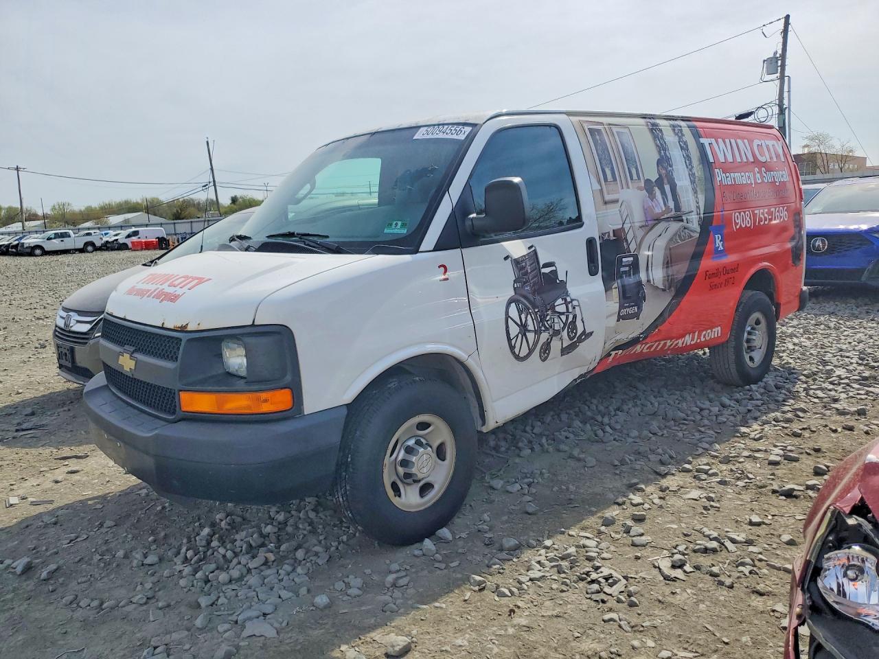 2016 CHEV Express VIN 1GCWGAFF2G1233163 photo 1