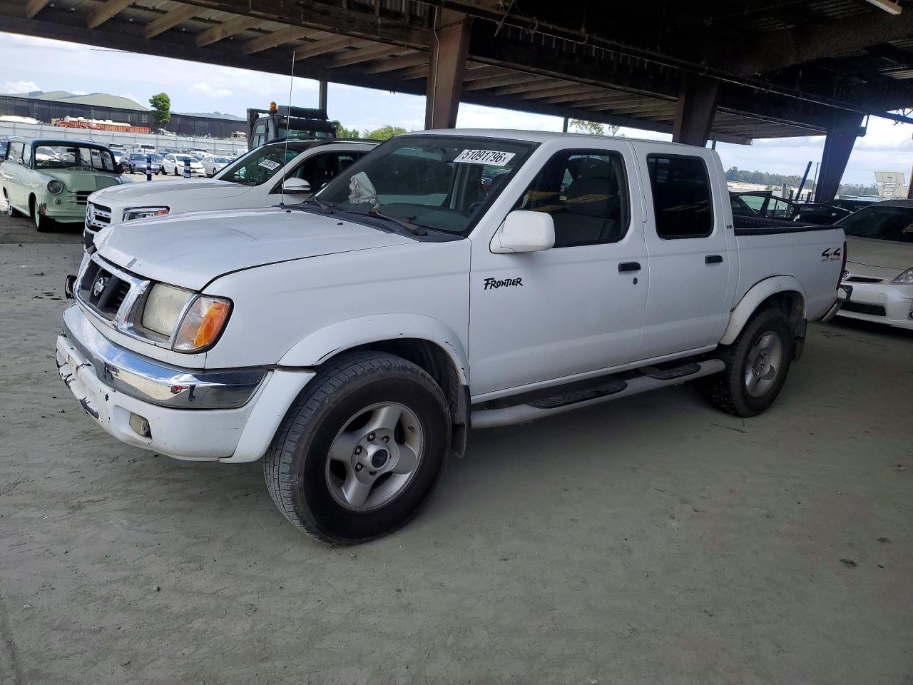 2000 NISSAN Frontier VIN 1N6ED27Y2YC338377 photo 1