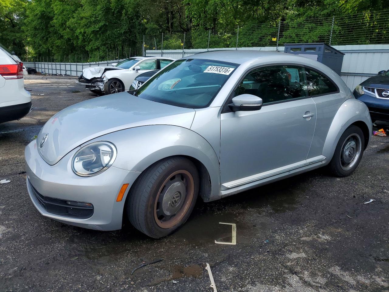 2012 Volkswagen Beetle VIN 3VWJP7AT6CM601896 photo 1