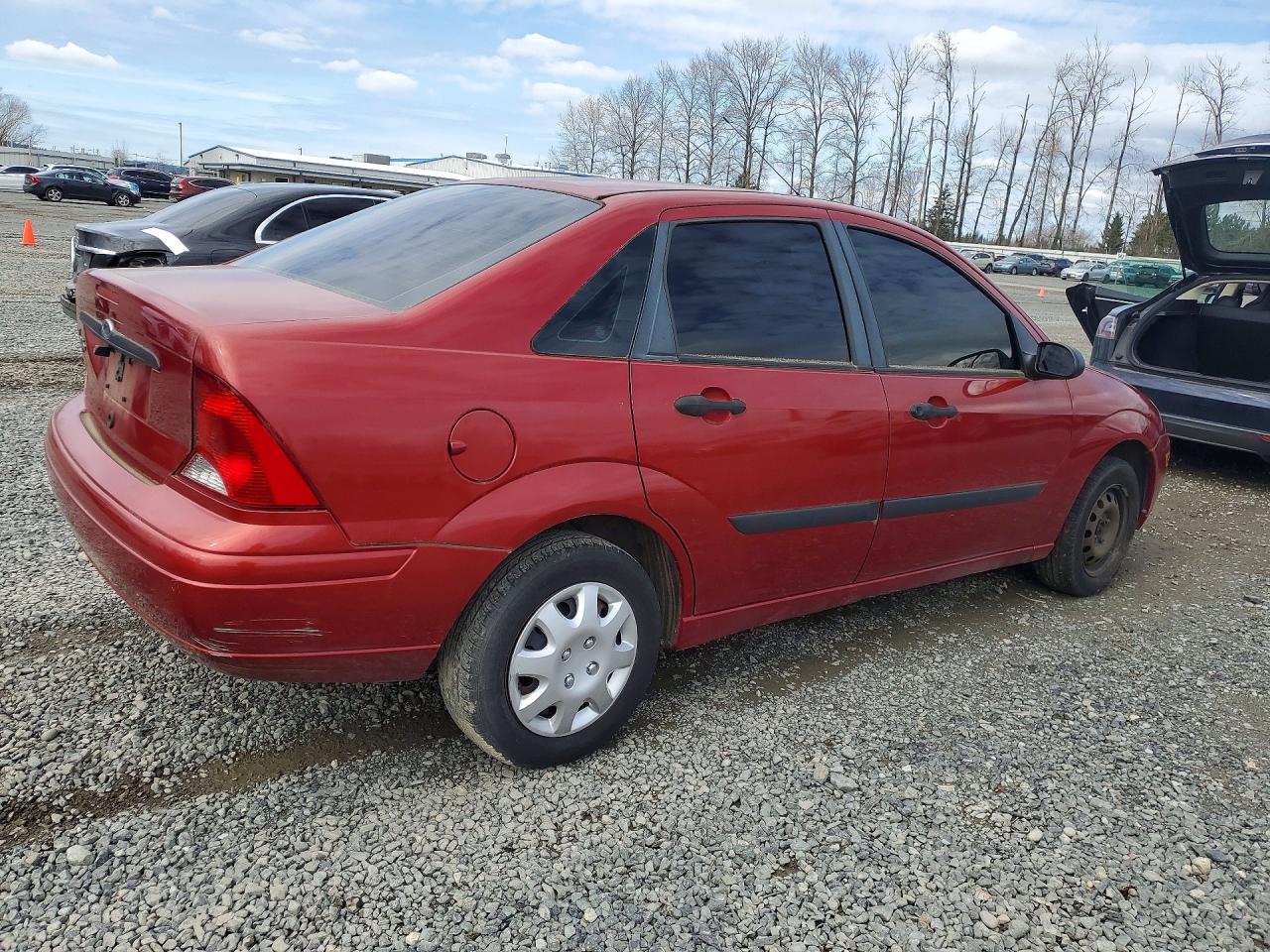 2004 Ford Focus VIN 1FAFP33P14W132192 photo 3