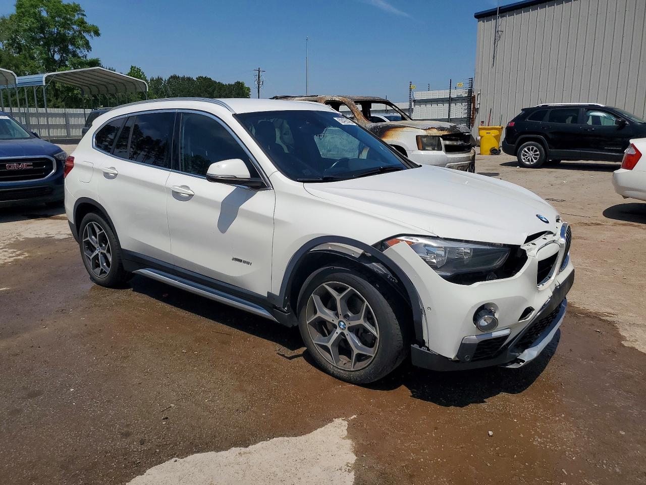 2016 BMW X1 VIN WBXHT3C35G5E56192 photo 4