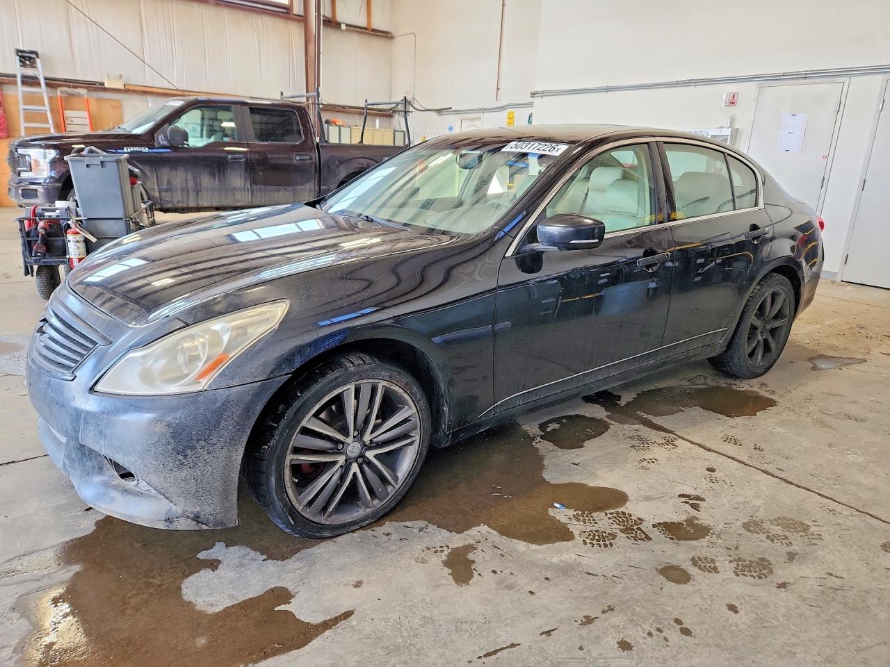 2011 Infiniti G25 VIN JN1DV6AR3BM653360 photo 1