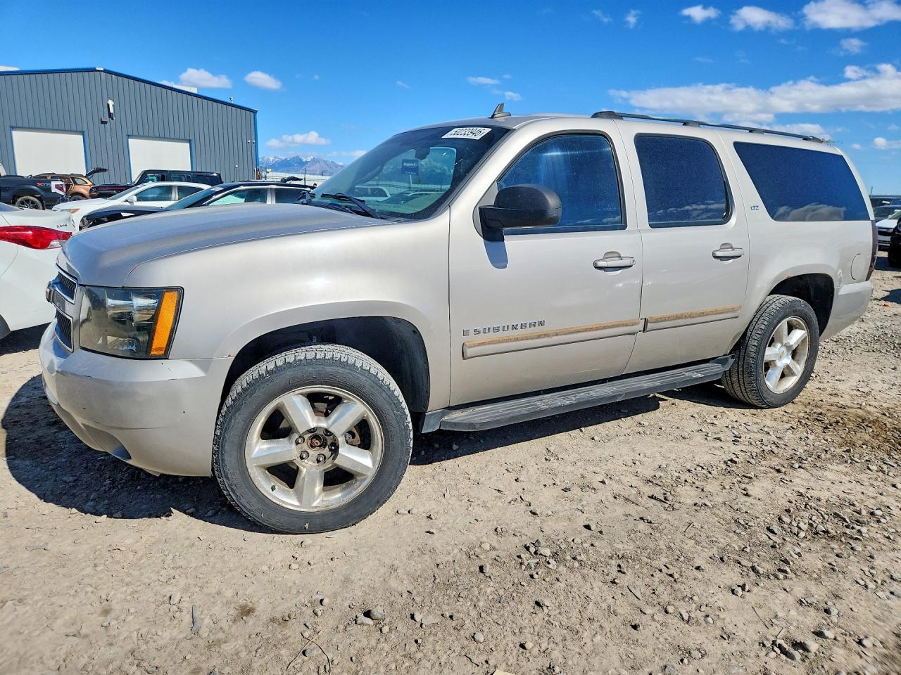 2007 Chevrolet Suburban VIN 3GNFK16387G145571 photo 1