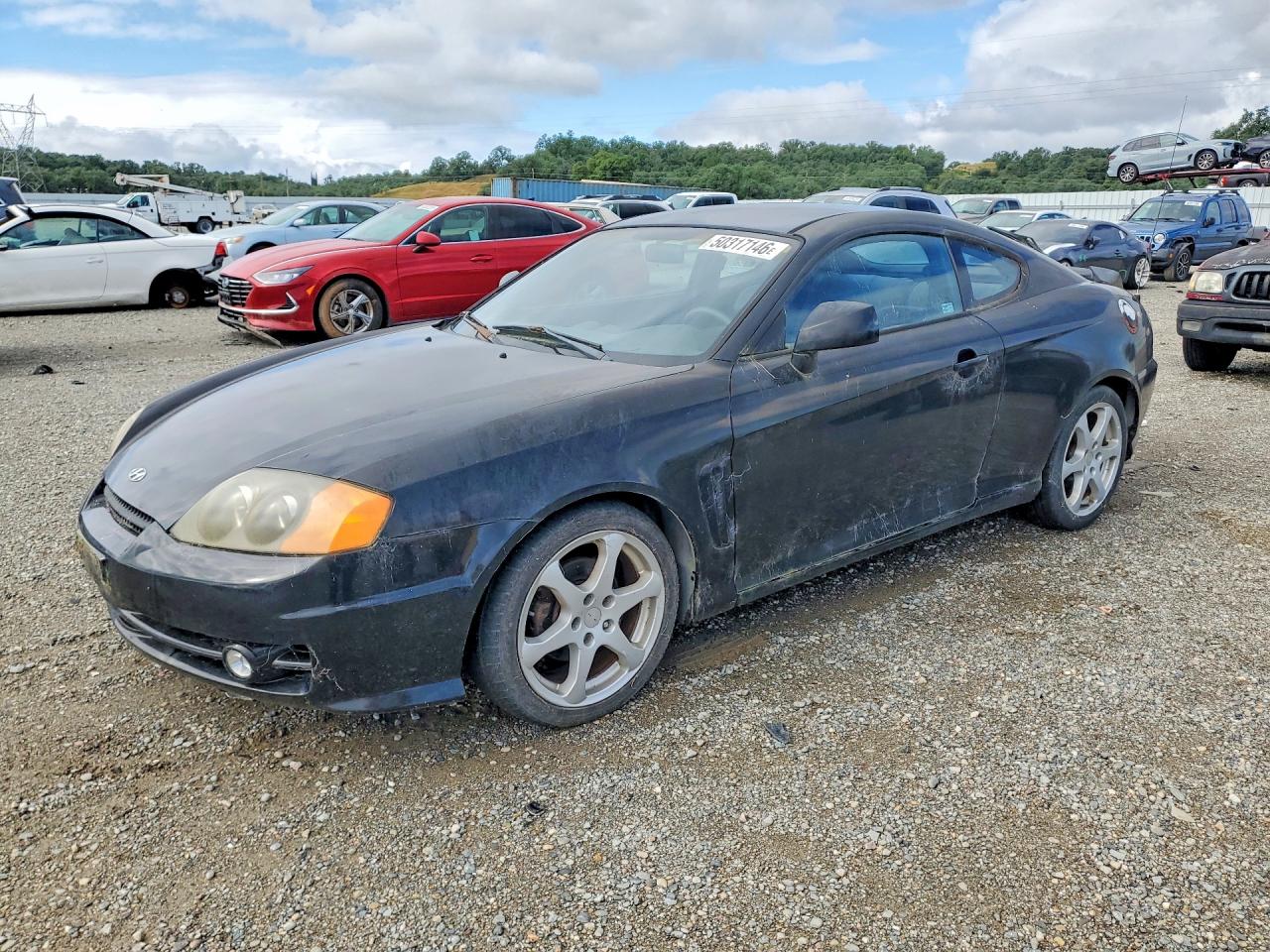 2003 Hyundai Tiburon gt VIN KMHHN65FX3U016509 photo 1
