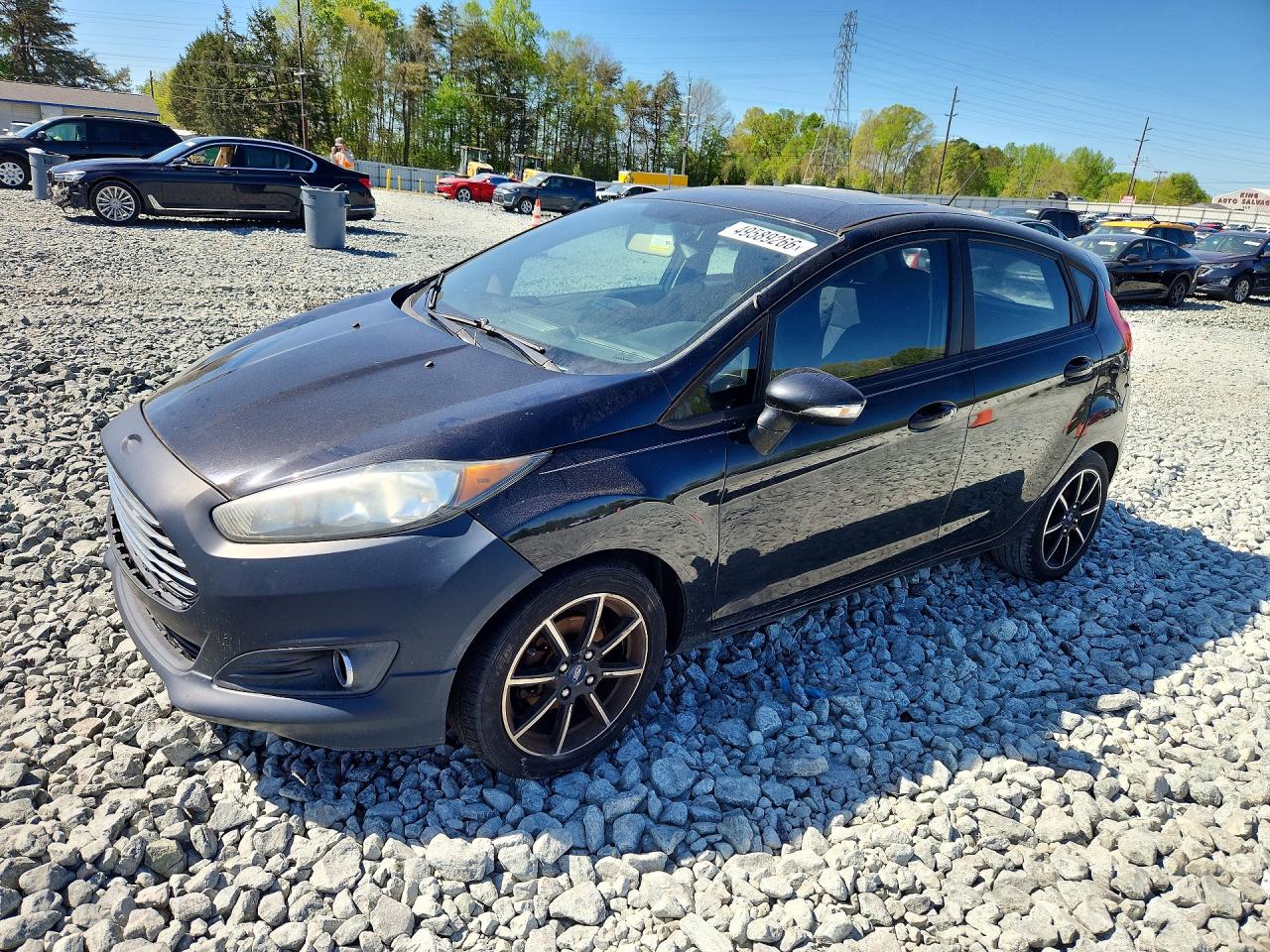 2015 Ford Fiesta VIN 3FADP4EJ9FM150397 photo 1