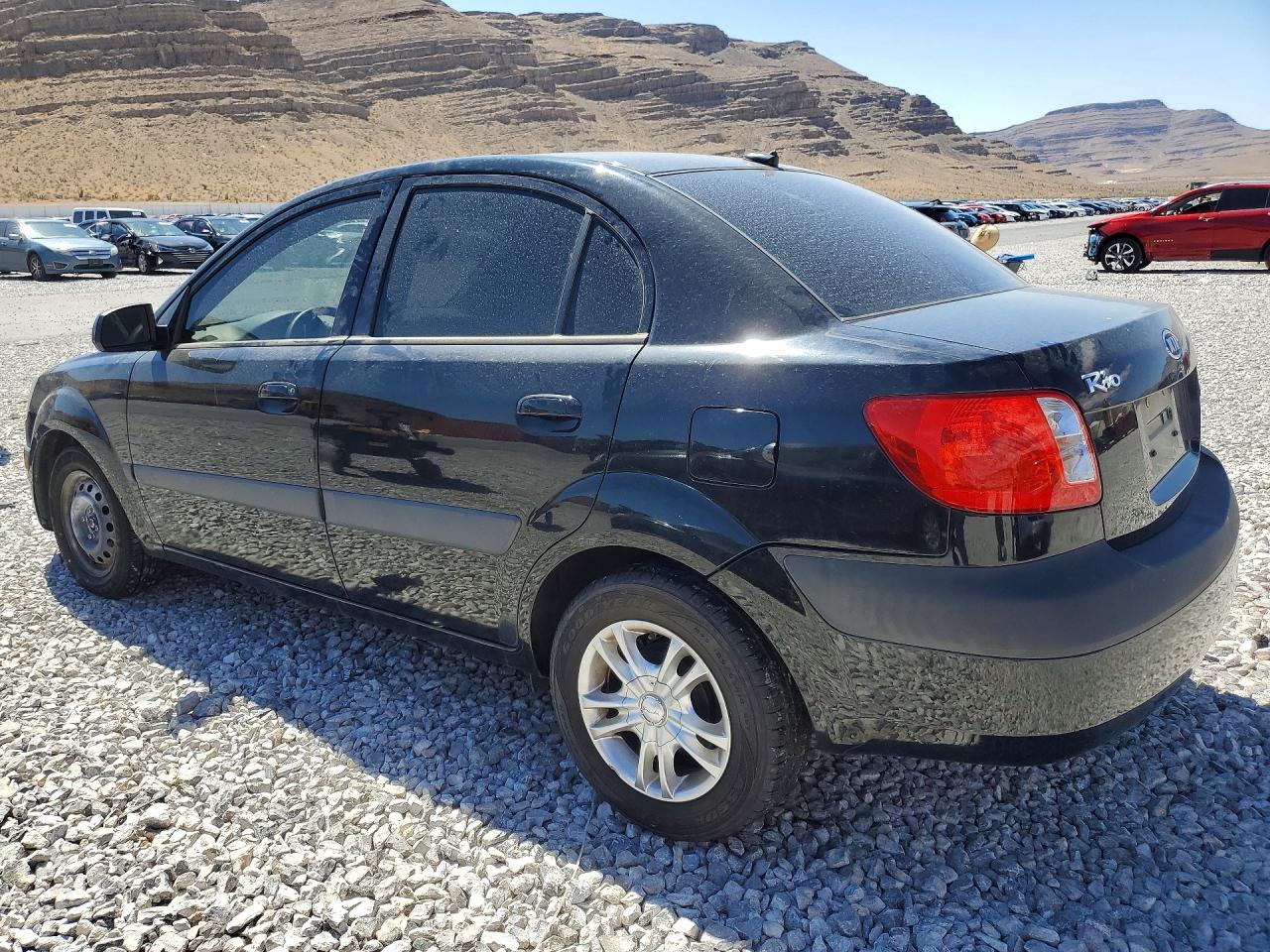 2009 Kia Rio VIN KNADE223696469459 photo 2