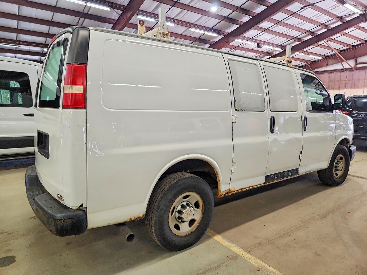 2014 CHEV Express VIN 1GCWGFCA4E1123119 photo 3