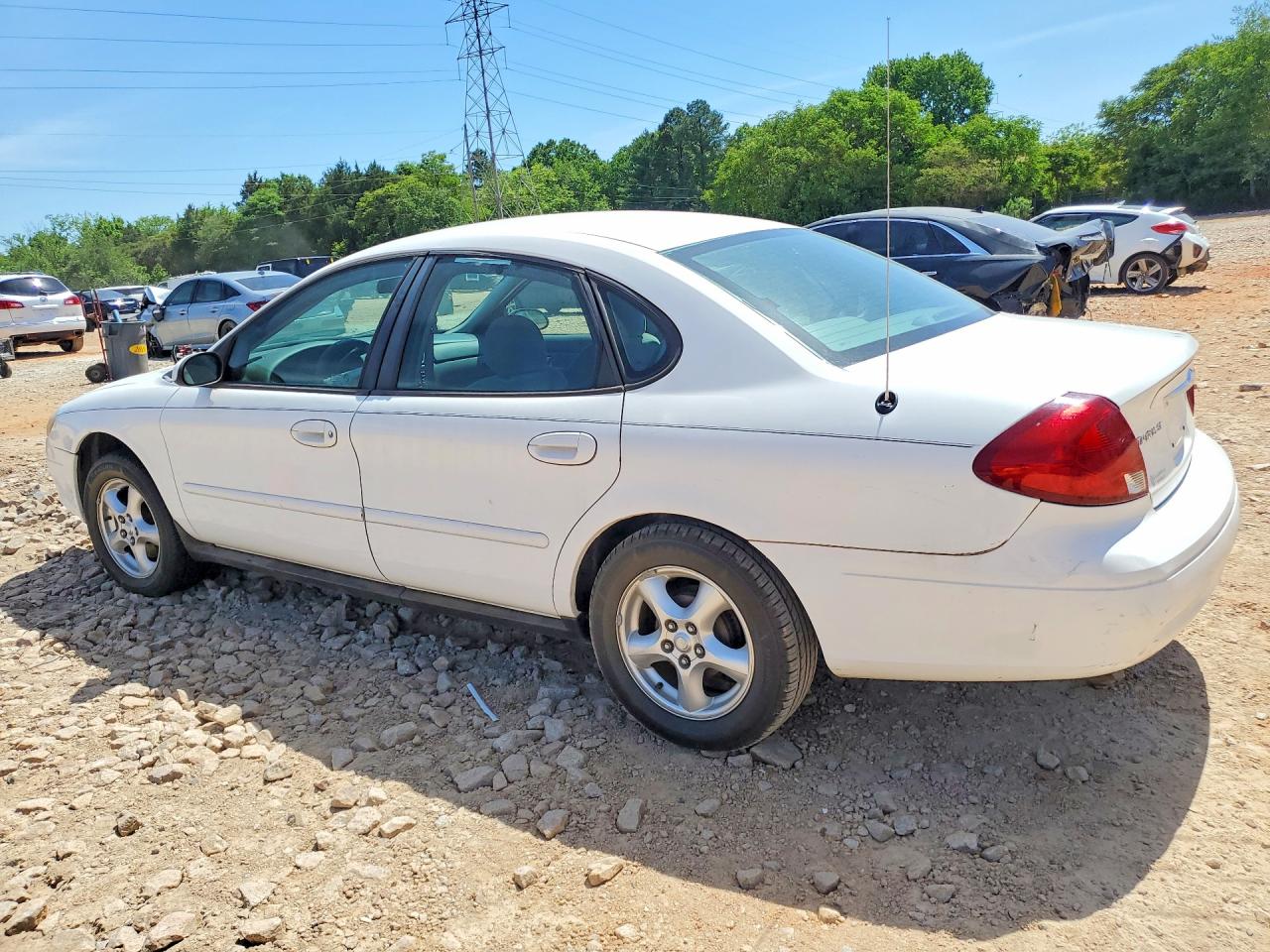 2002 Ford Taurus VIN 1FAFP53UX2A122305 photo 2