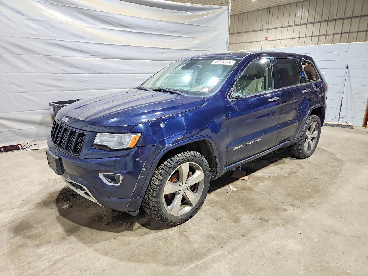 2014 Jeep Cherokee VIN 1C4RJFCG6EC409335 photo 1